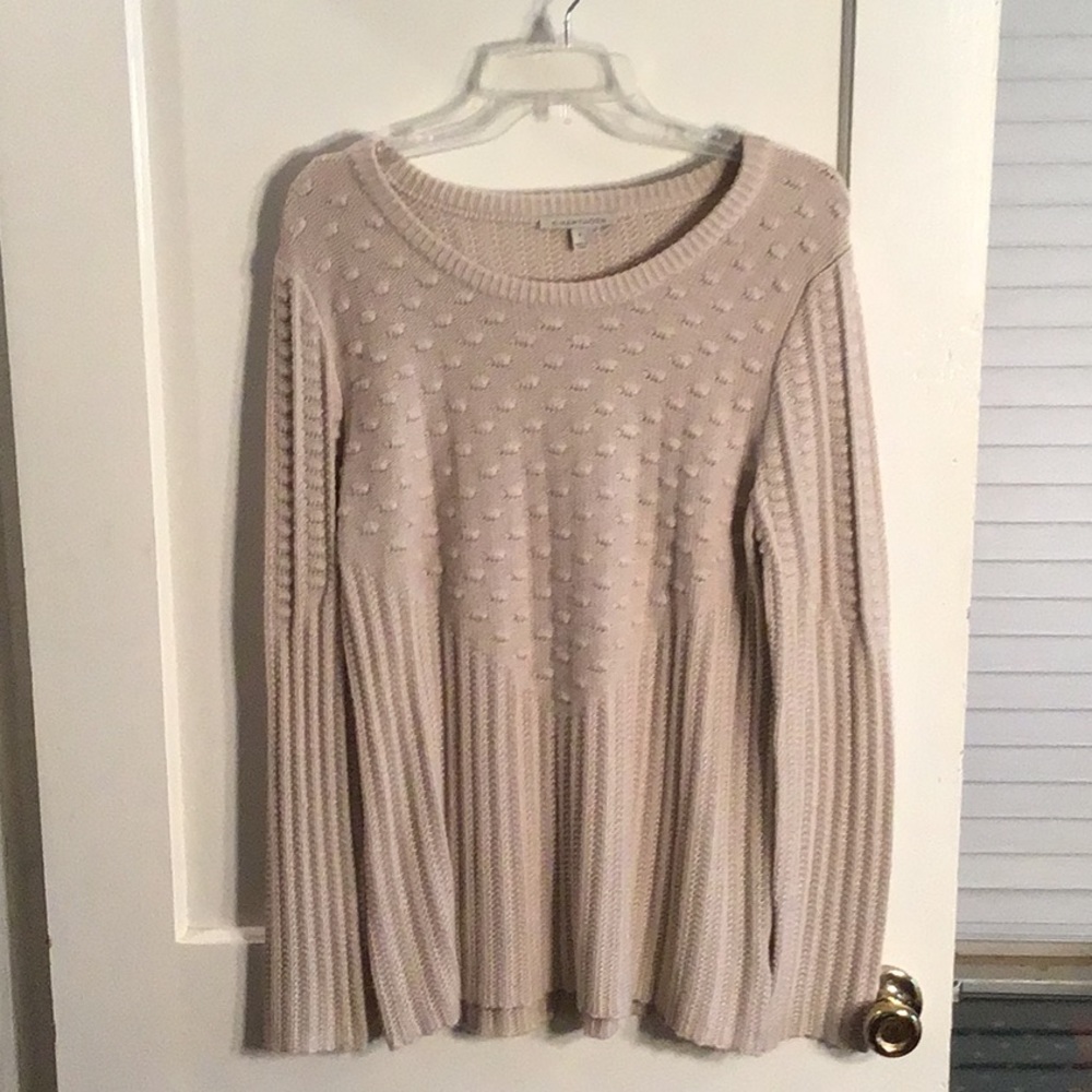 Tan sweater.